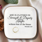 She is clothed in Strength Inspirational Gifts for Women Ceramic Ring Dish Birthday Gifts for Women Unique, Best Friends Gifts For Women Her Mom Sister Coworker
